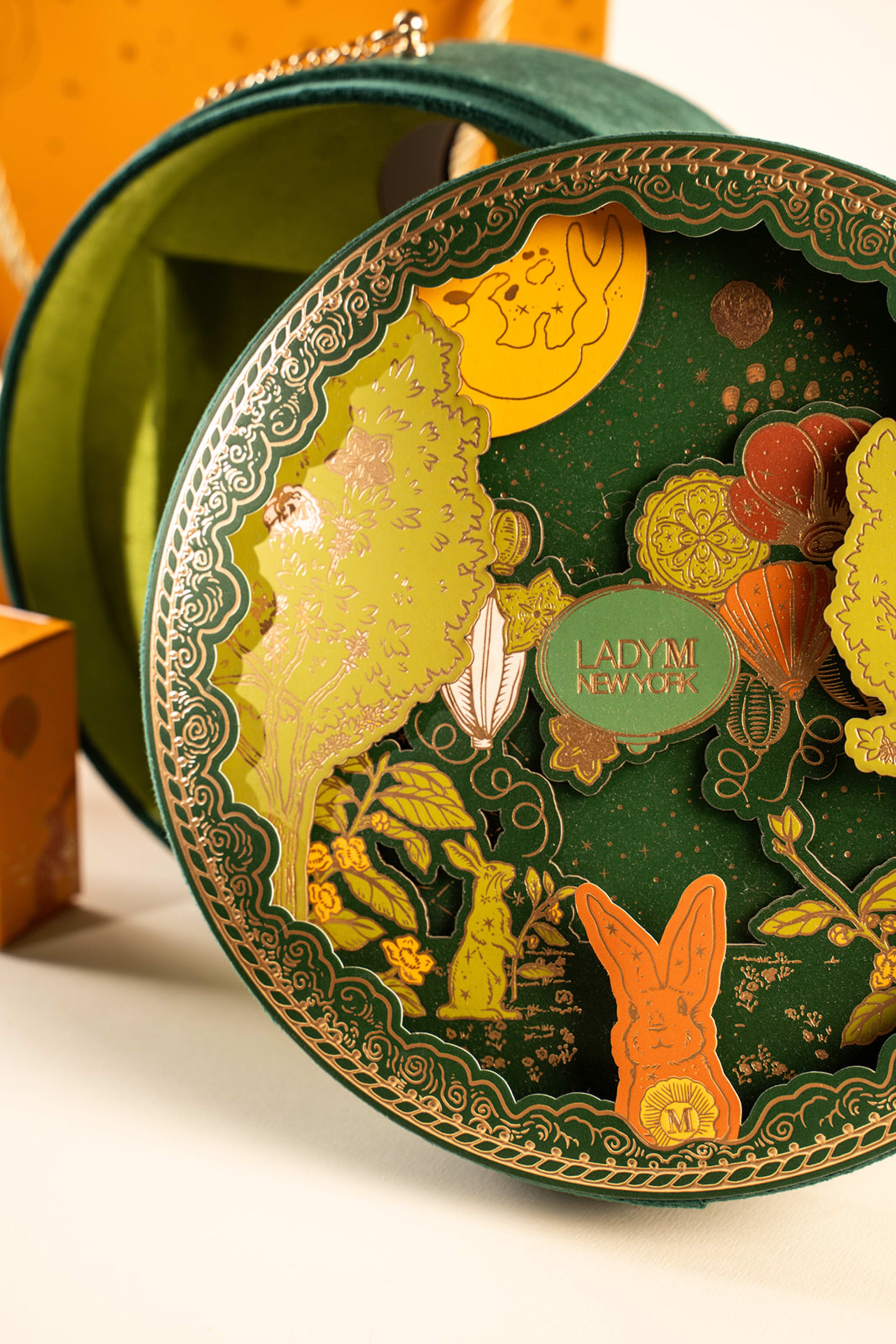 Lady M illustrated box, close-up detail on a table
