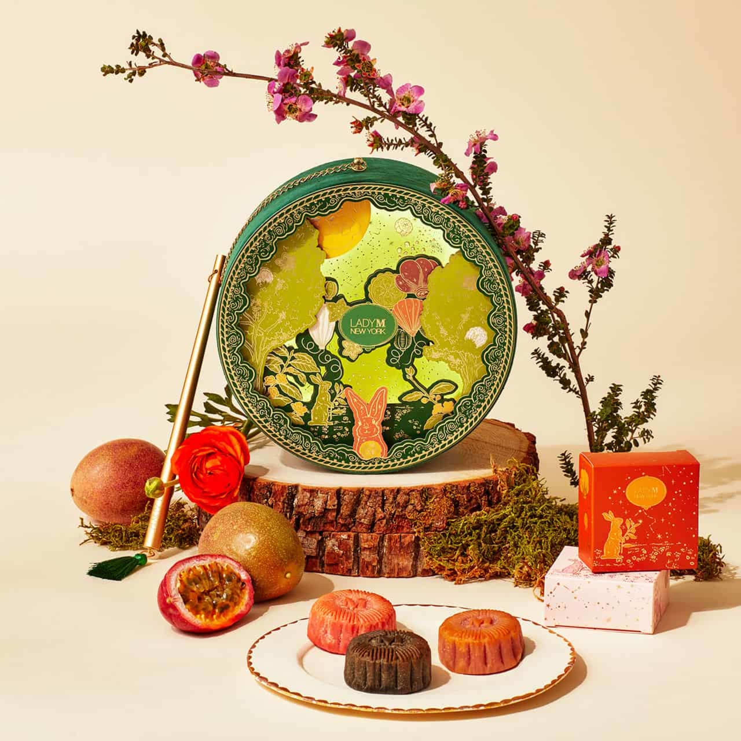 Lady M illustrated box with jade babbit scene in green