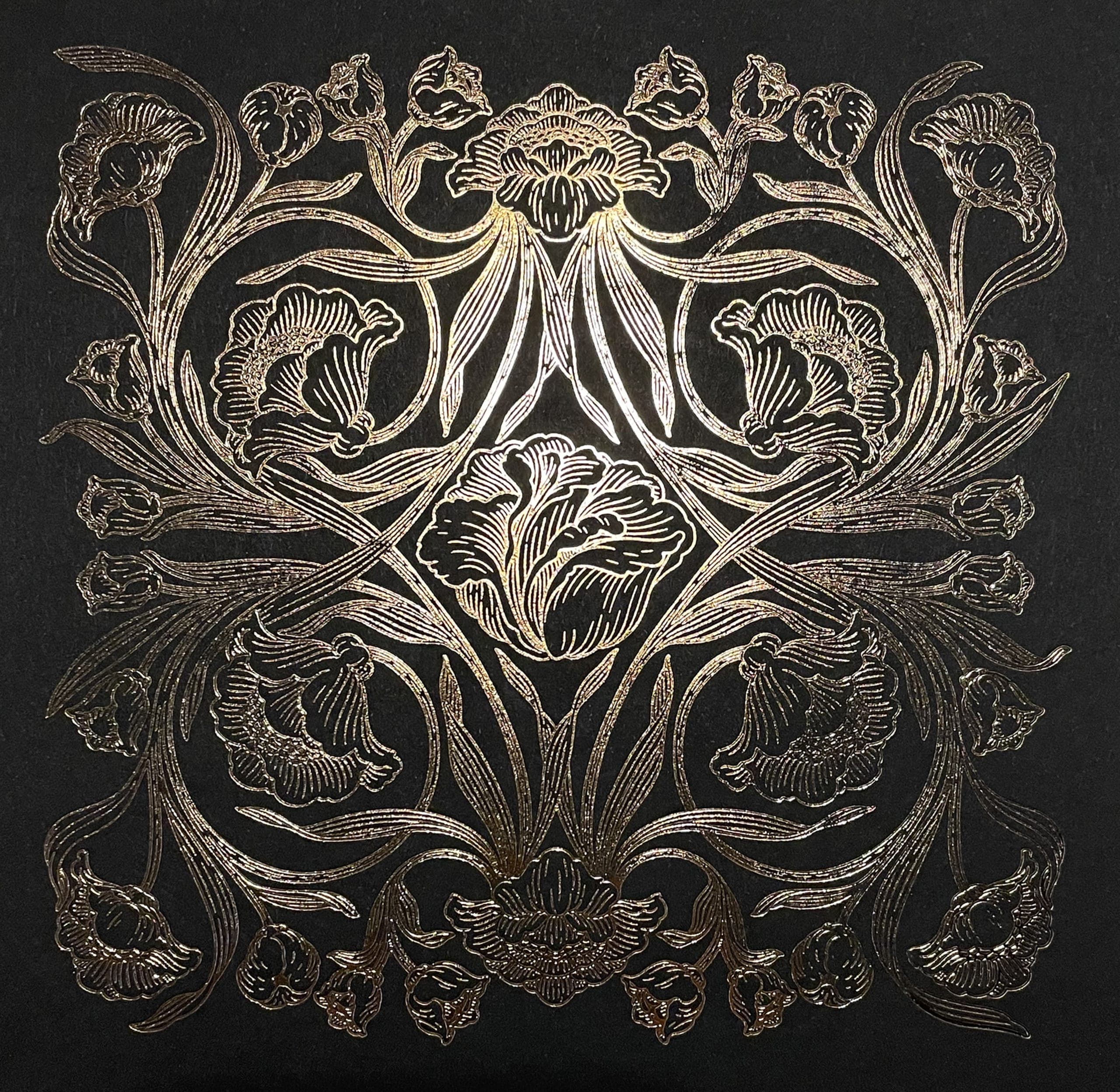 Elegant greeting card with a black background and a central, highly detailed gold illustrated ornament motif.