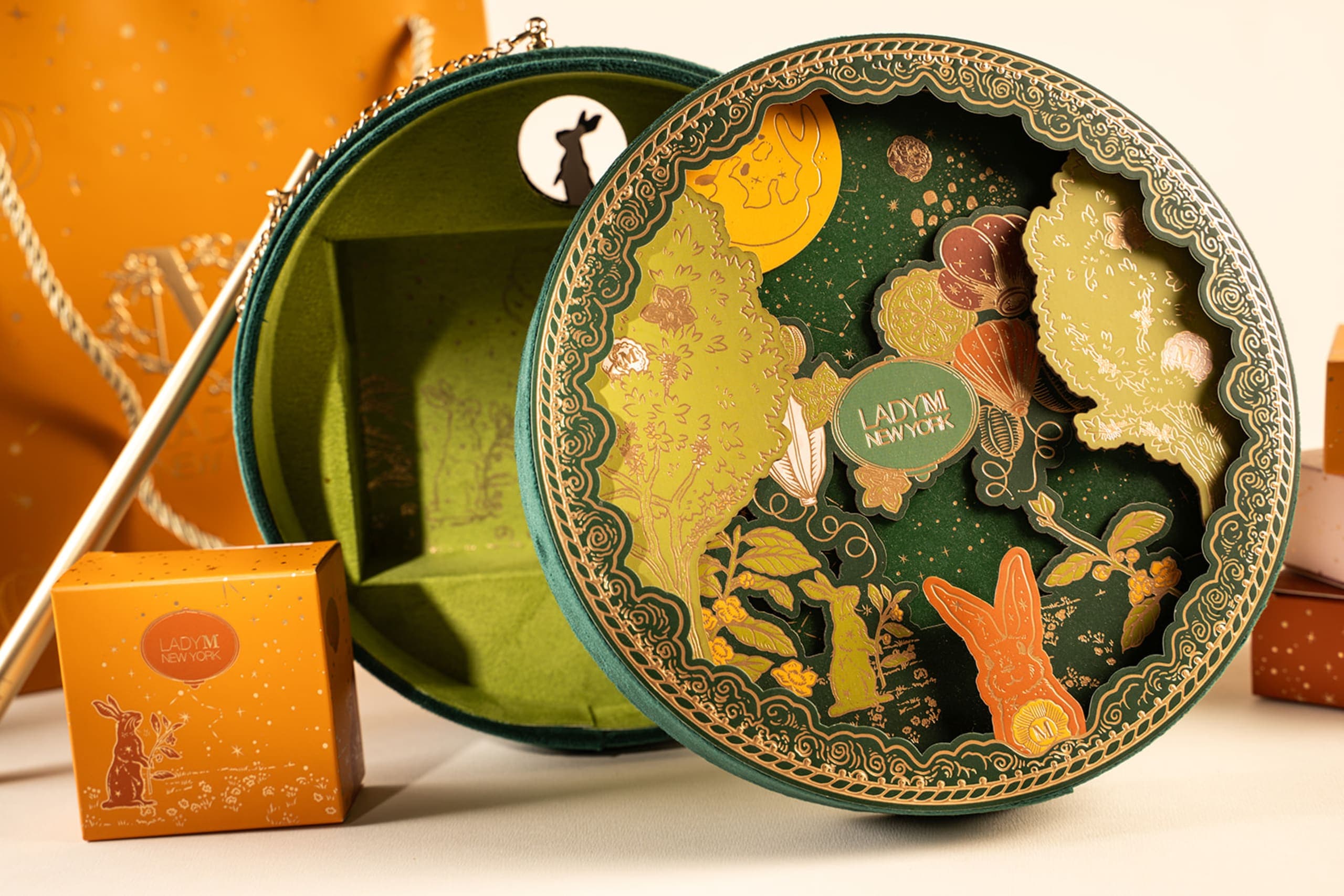 Lady M illustrated mooncake gift box with animal motif interior