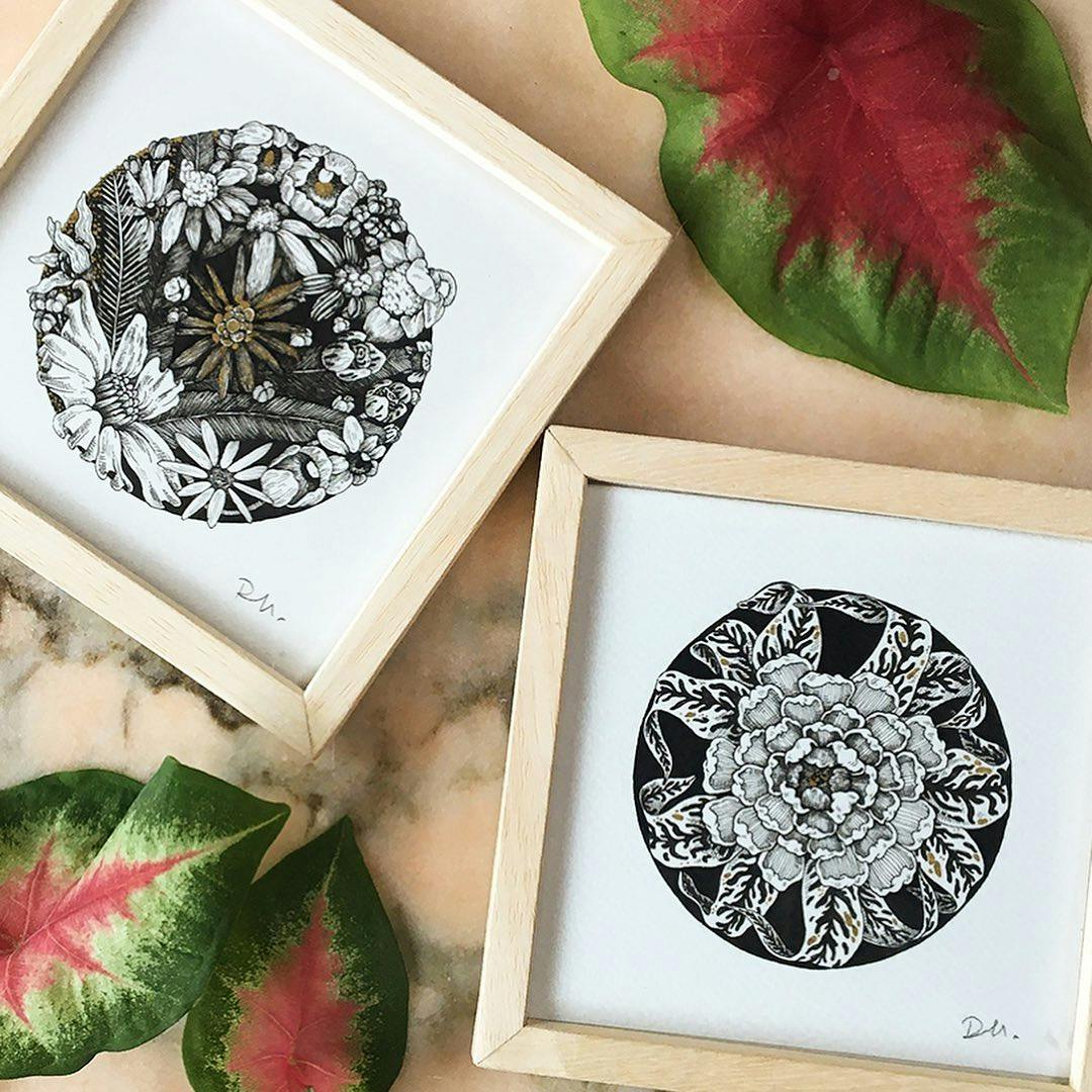 Pictures of two floral framed illustrations.