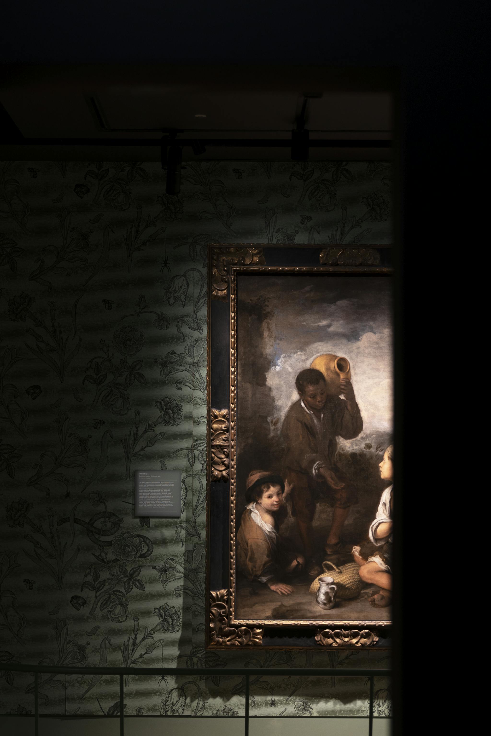dramatic photo of the Spanish gallery with the illustrated wall paper